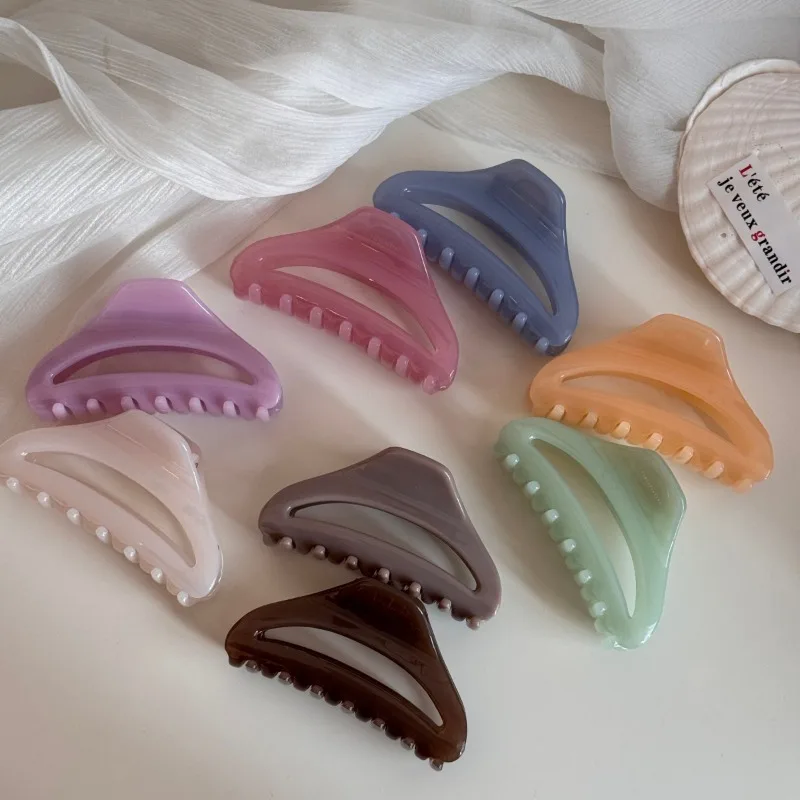 Hollow curved medium grab clip high end gold label hairpin female back head disc hair shark clip view 3