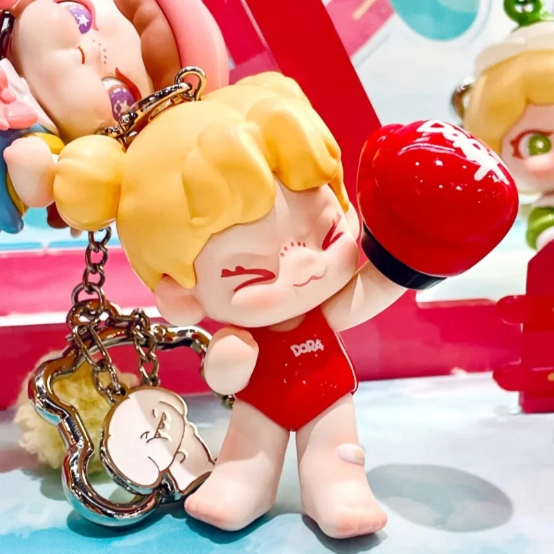 Baby Dora Tiny Time Series Scatola cieca Scatola misteriosa Dora Figura pendente carina Gioco alla moda Ornamento Bambola Regalo di compleanno a sorpresa Giocattolo