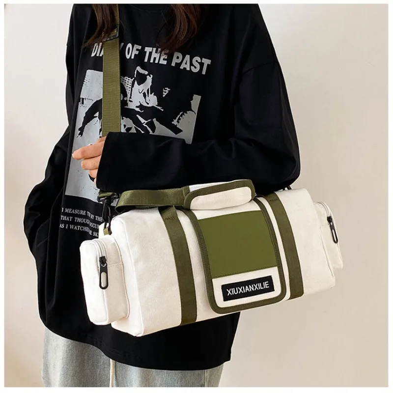 New Neutral Leisure Travel Canvas Pillow Bag with Large Capacity Sports and Fitness Storage Handheld One Shoulder Crossbody Bag