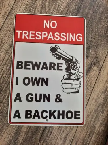 No Trespassing I own a Gun and a Backhoe 8x12 Metal Wall Sign