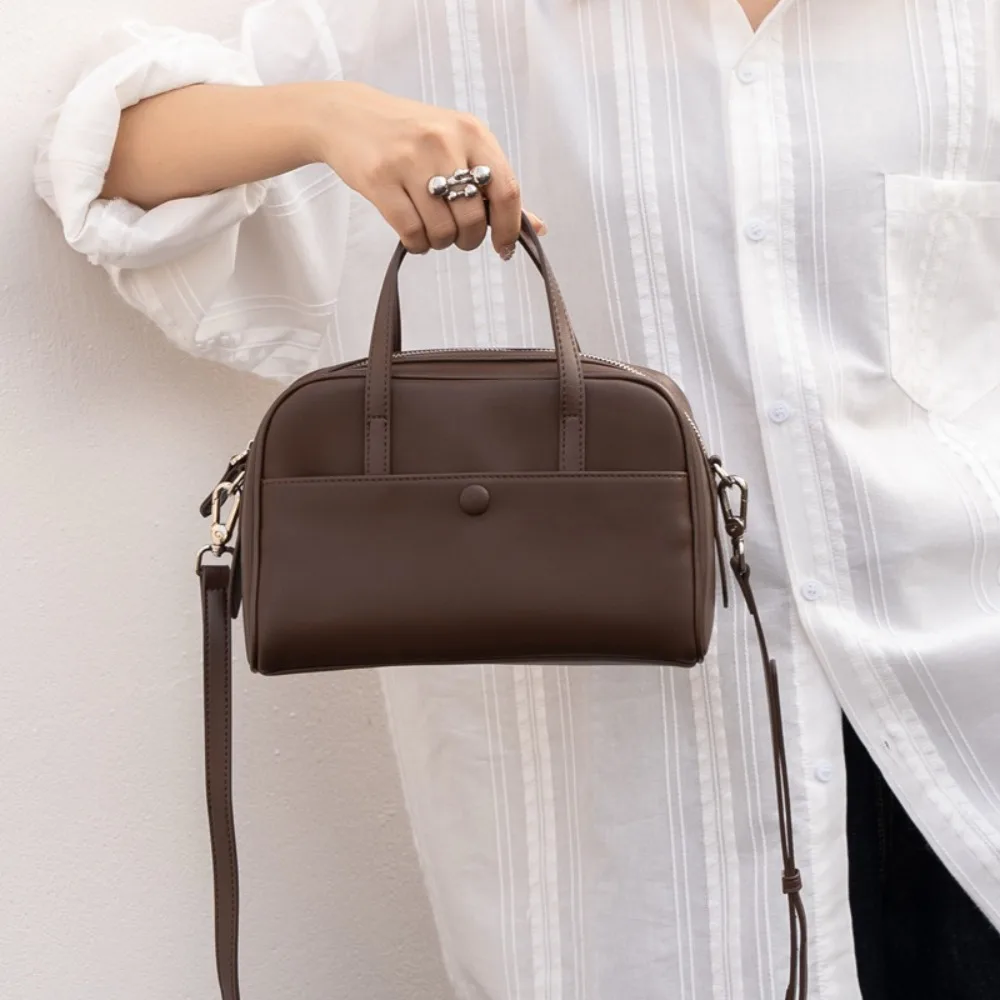 

Кожаная сумка из воловьей кожи для осени и зимы, новая, в стиле ретро, из мягкой кожи, для повседневного использования, классический нишевый дизайн, простая и универсальная, премиум-класса, для повседневной носки.