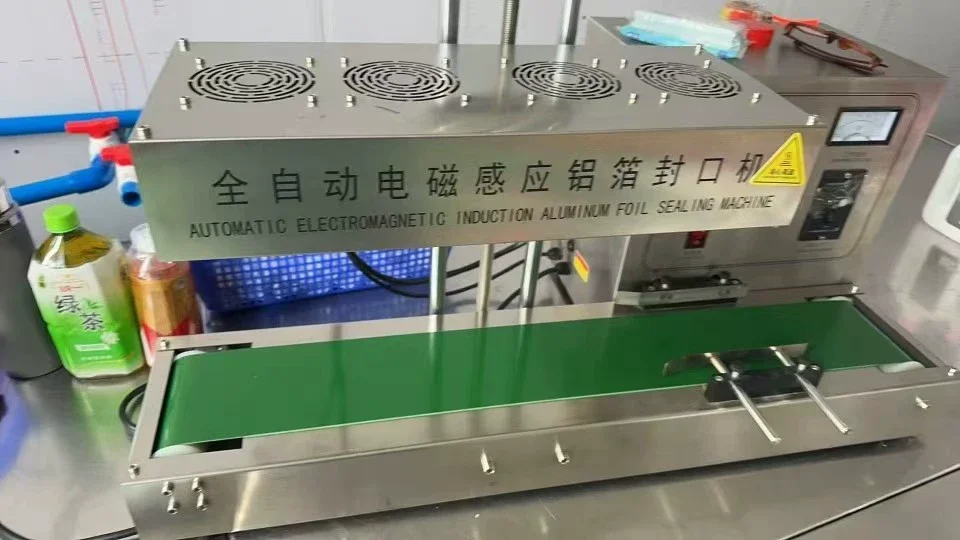 Automatic Continuous Electromagnetic Induction Sealing Machine Aluminum Foil Cap Sealer for Honey Plastic Bottle Oil Drum