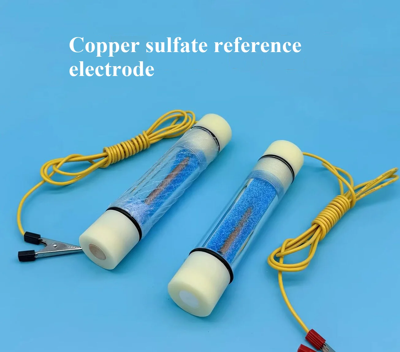 Portable copper sulfate reference electrode with porous ceramic core and wooden stopper bottom