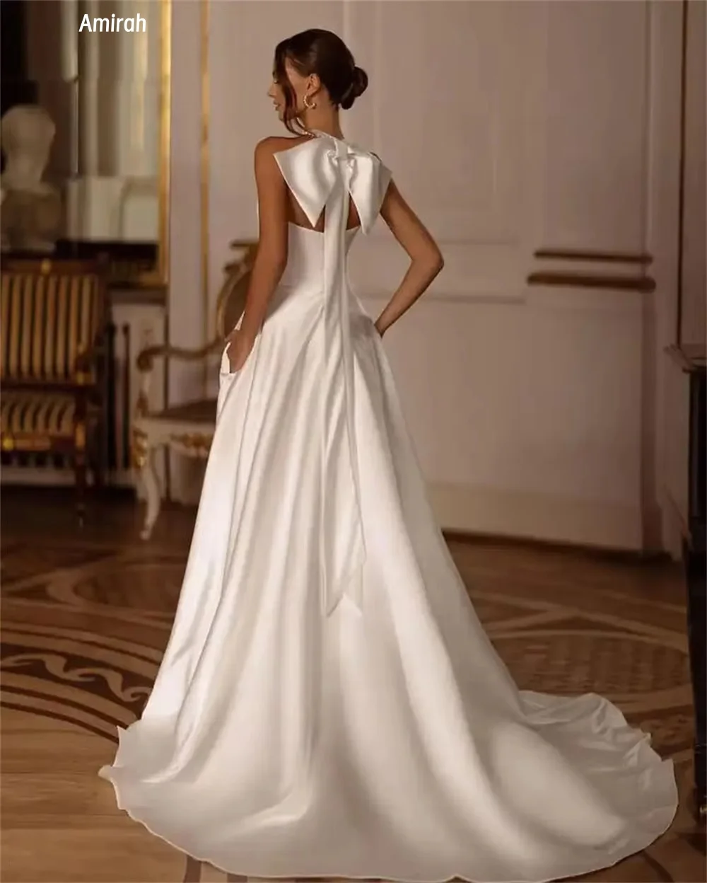 Amirah Back Bow Abiti da sera di lusso 2025 A-line con spacco laterale Abito da festa elegante da donna di lusso Colletto senza maniche su misura