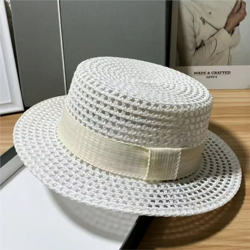 A new style of hollowed-out sunshade and hat for women with wide brim large to show off the face