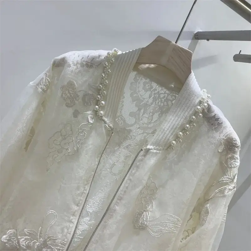 

﻿ Summer Clothes New Chinese Style High-End Nail Bead Embroidery Sun Protection Jacket Round Neck Design Baseball Jacket Top La