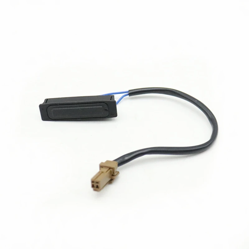 Pulsante di apertura del bagagliaio dell'auto Interruttore di apertura del portellone posteriore per Clio Captur Scenic Kangoo Numero OEM di riferimento 8200076256