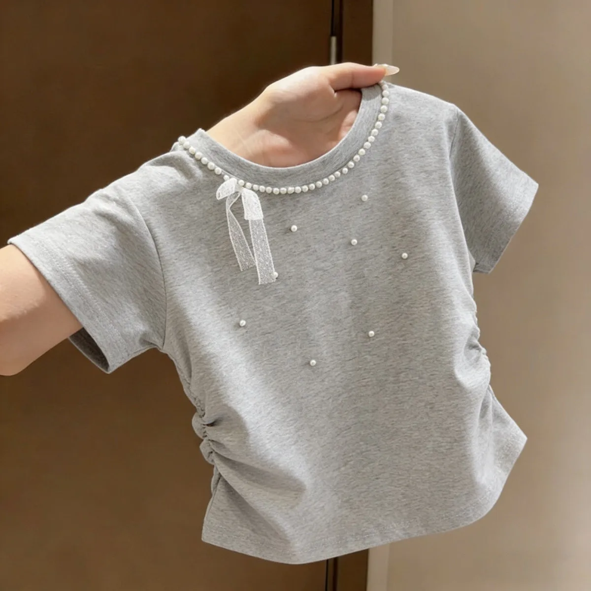 Girls' lace bow short sleeved T-shirt summer new mid size children's nail bead design half sleeved top