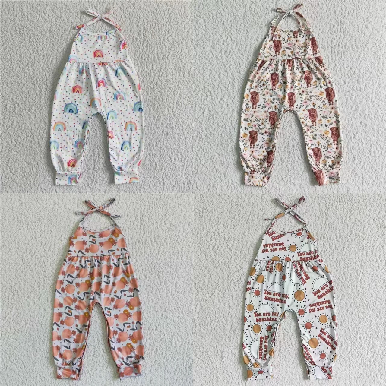 

Wholesale Sleeveless Jumpsuit Toddler Children Western Cow Flower Rainbow One-piece Clothing Baby Girl Kids Pants