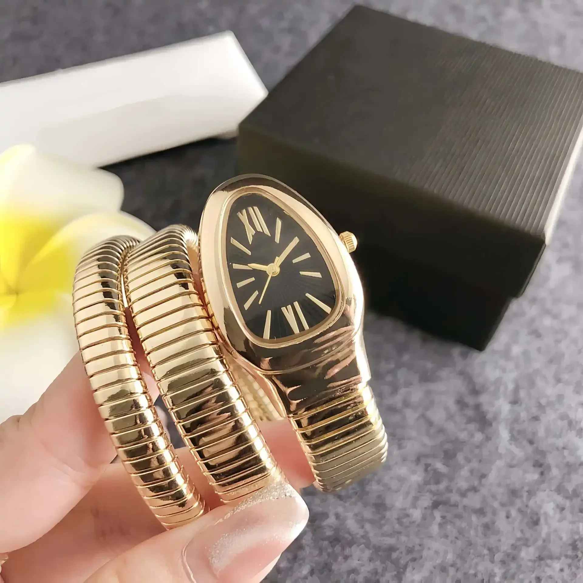 Aaa + clássico simples moda venda quente cobra relógio de quartzo feminino luxo ouro aço relógio suave vestido à prova dwaterproof água relógio feminino