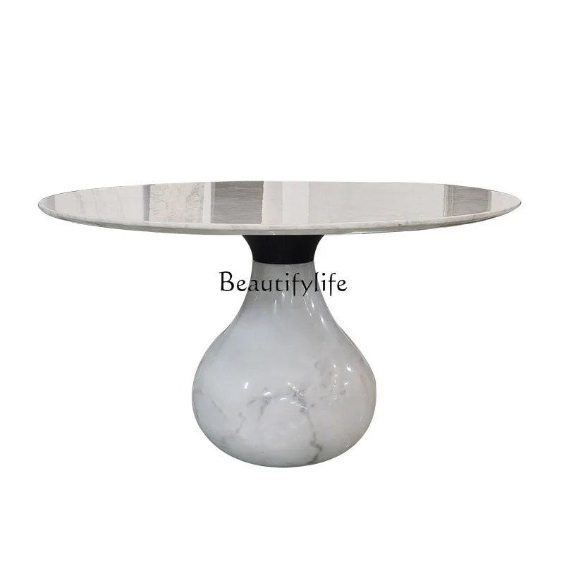 

Italian natural marble dining table high-grade marble cream French light luxury round table