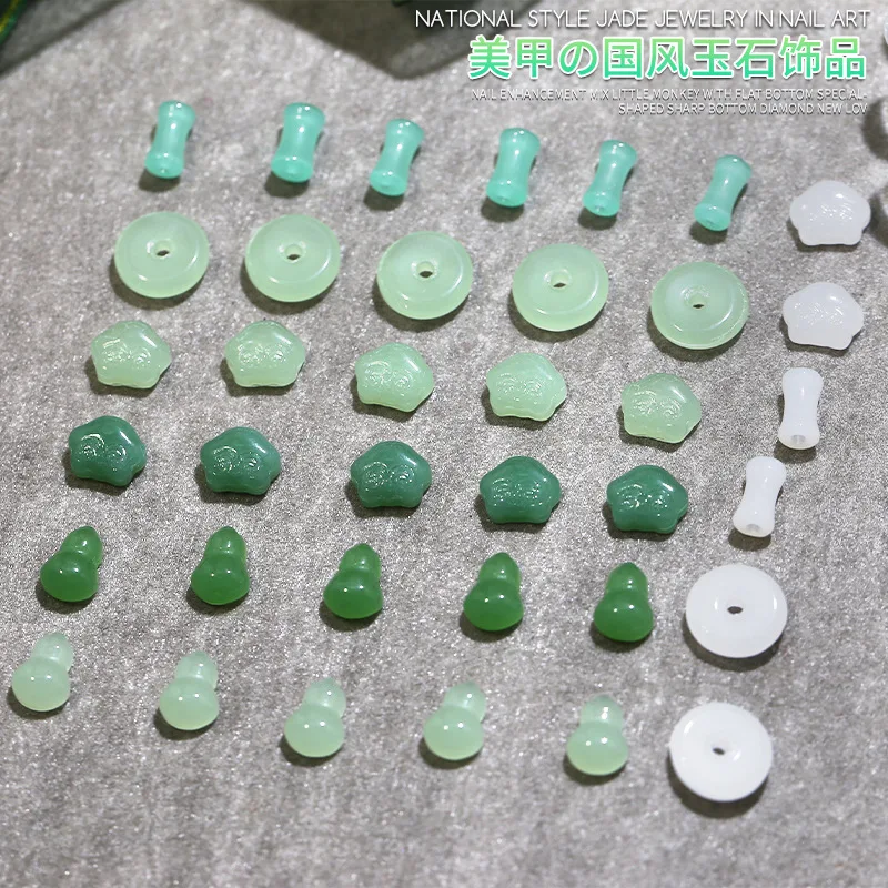 100PCS Mix Chinesische Alte Jade Weiß Grün Runde Schmetterling Ruyi Kürbis Nail art Strass Dekorationen Maniküre Glänzend Charme