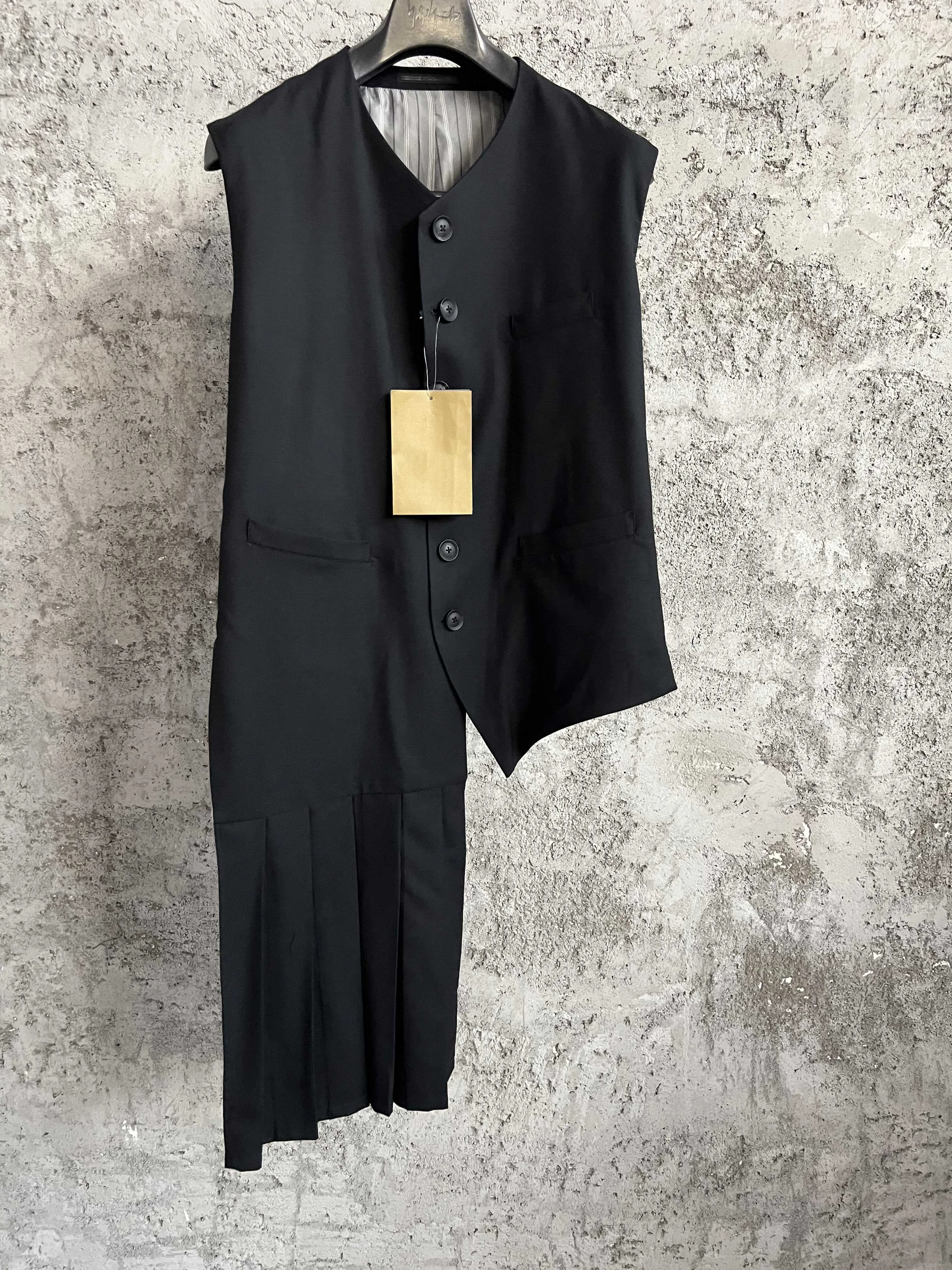 The waistcoat, tailcoat, asymmetrical pleated wool, gabard, waistcoat, sleeveless, niche