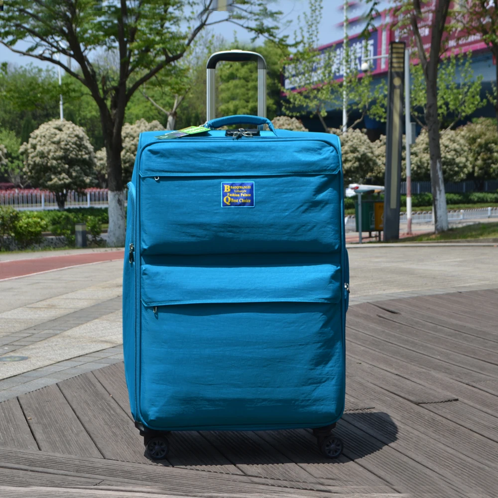 valise-en-tissu-de-bœuf-avec-roues-a-quatre-voies-sac-de-voyage-avec-boite-de-mot-de-passe-sac-a-main-pour-voyage-international