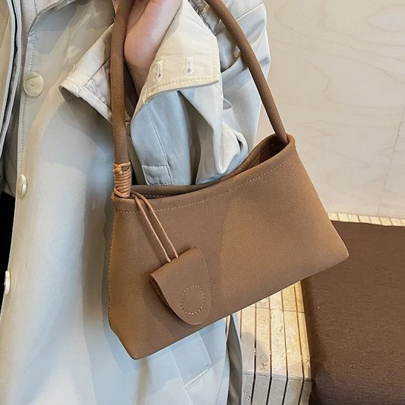 

Modish Women's Handbag Made Of Nubuck Leather Boasting Casual Latvia Trendy Spacious Soft Daily Look