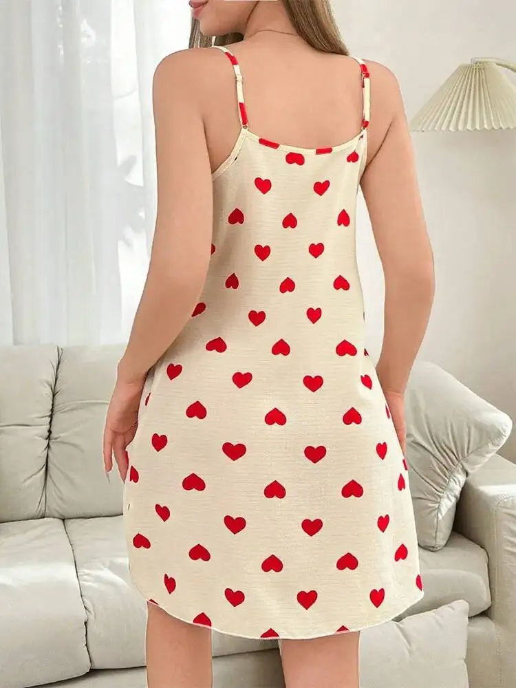 Venta caliente de verano camisón de seda de leche vestido de tirantes Sexy ropa de casa para mujeres Casaul vestido elegante vestido con estampado de corazón encantador 80LB