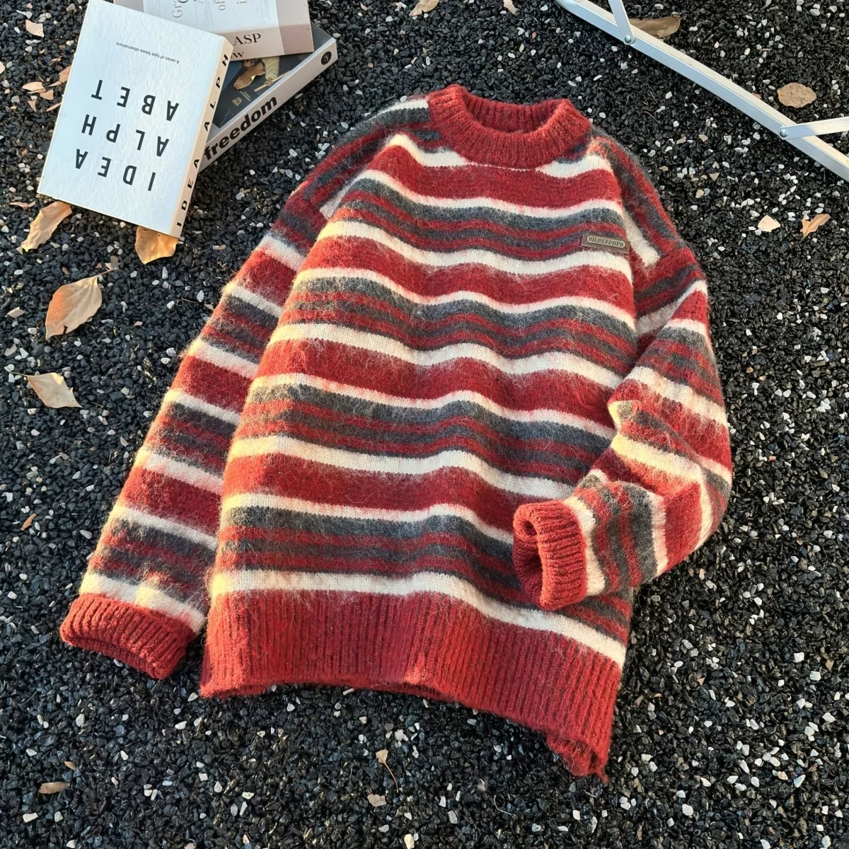 Maglione lavorato a maglia allentato rotondo Ne con design a righe retrò americano e maglione casual pigro versatile autunno inverno