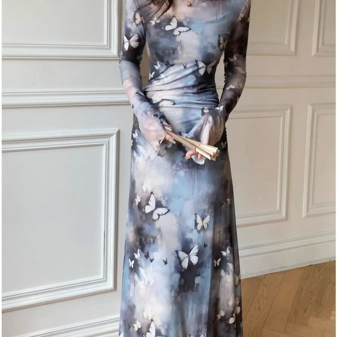 Vestido ajustado con cintura y mangas acampanadas estilo tinta 2025 principios de otoño nueva Falda larga envuelta en la cadera de mariposa de manga larga a la moda