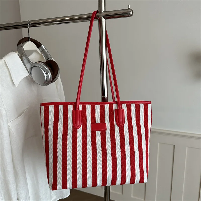 

Large capacity bag women's 2026 summer new versatile fashion single shoulder trend commuting retro casual tote bag