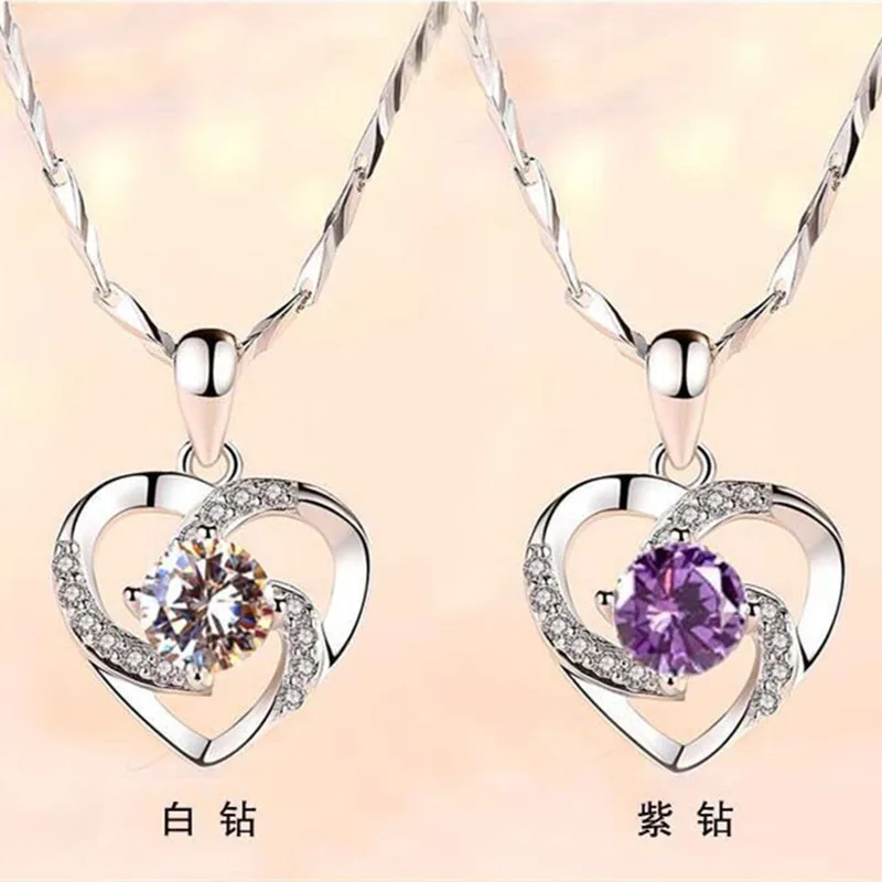 Heart-shaped pendant crafted from white copper with diamond accents and genuine pearl detail in net-red style — available in whi