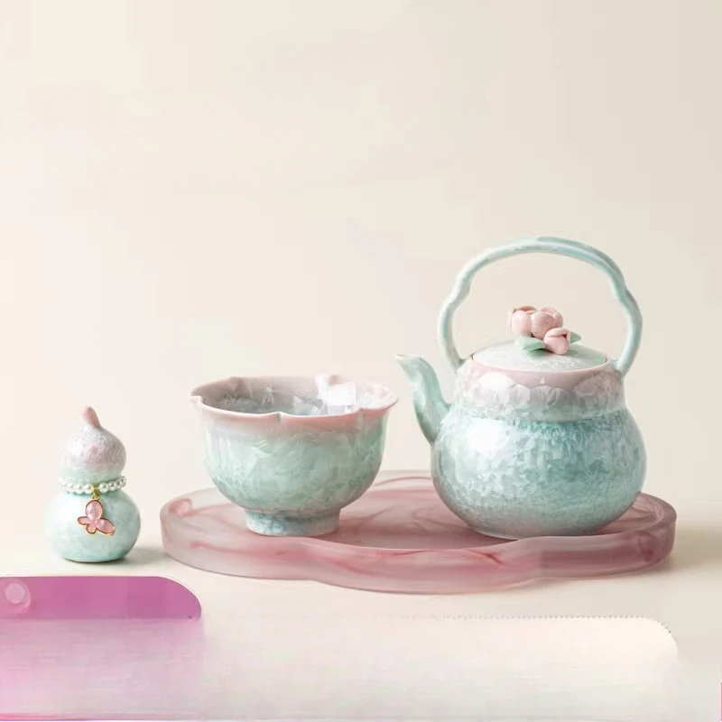 Glazed hand-pinched flower jacquard pot set, ceramic one pot and one cup.
