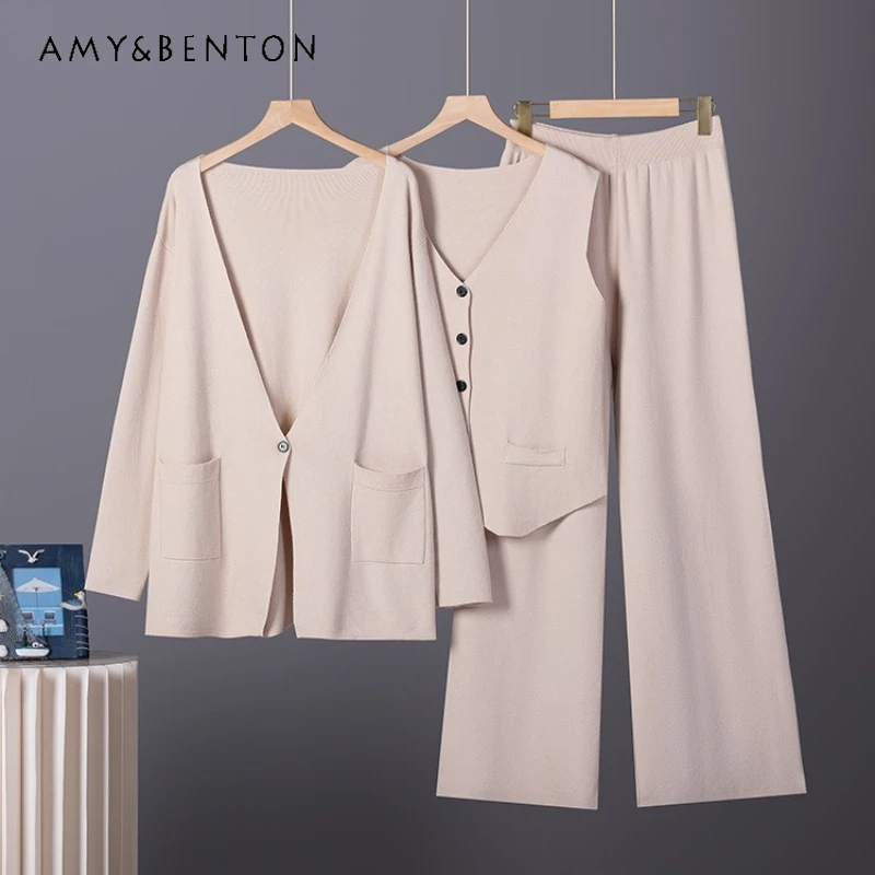 

Европейско-американский модный вязаный женский костюм 2026: весенний свободный универсальный повседневный комплект из свитера, жилета и брюк-палаццо (3 предмета) для женщин