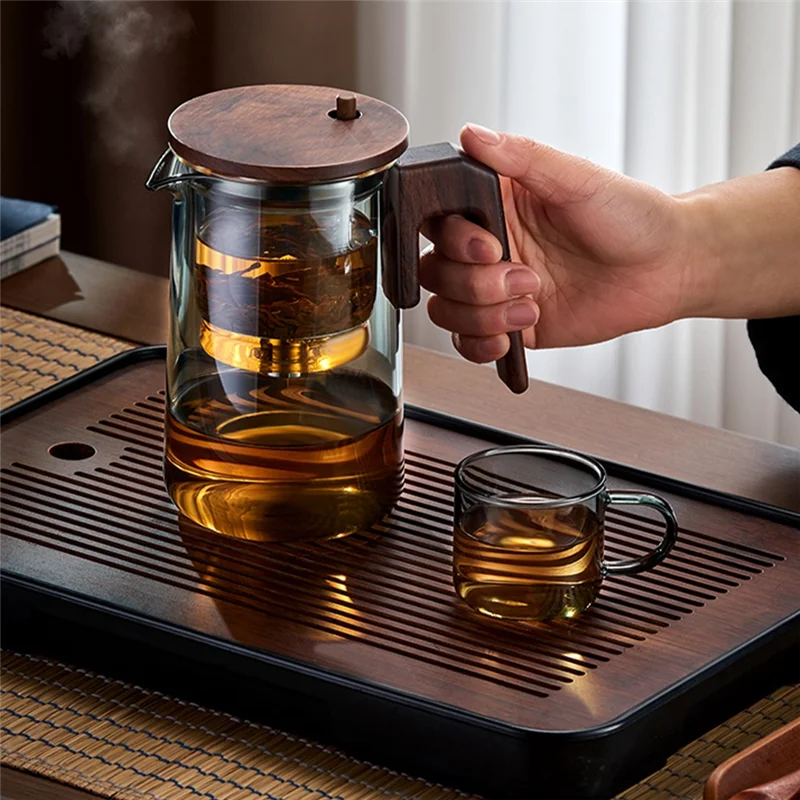 กาน้ําชาแก้วพร้อมที่จับไม้อุ่นปุ่มเดียวกรองหม้อชาหอมใส Teaware