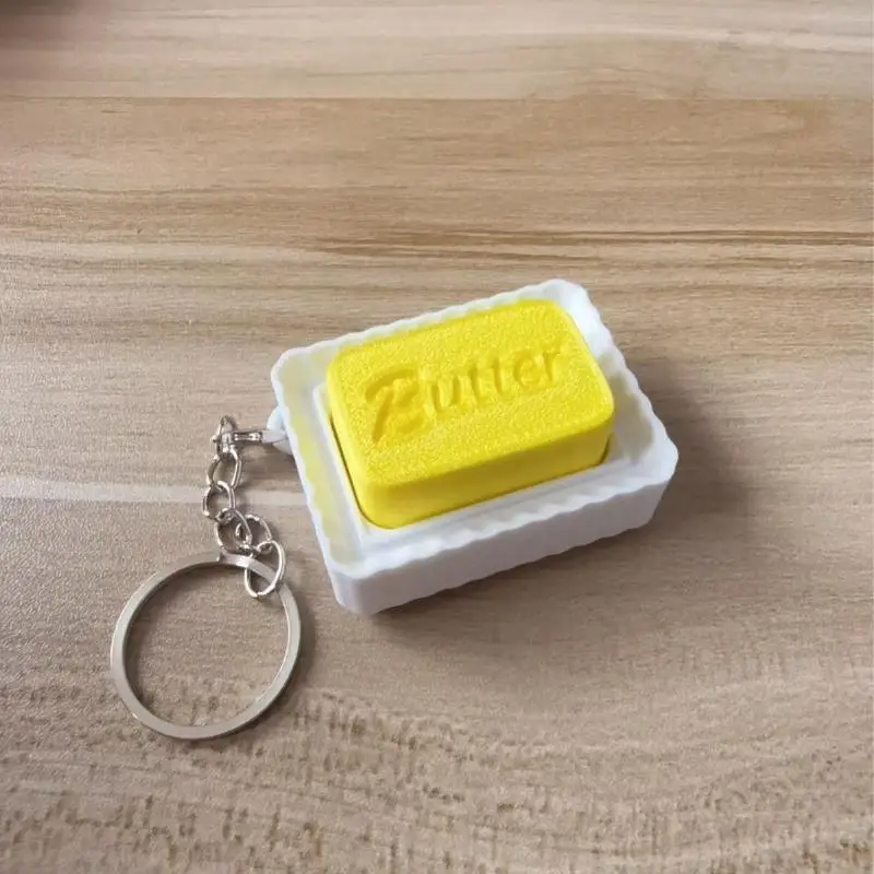 Niedlicher Butter-Slider-Schlüsselanhänger, simulierter Butter-Clicker, tragbares sensorisches Fidget-Spielzeug zur Angstlinderung, Taschenanhänger, Taschen-Ersatzteile – Detail 6