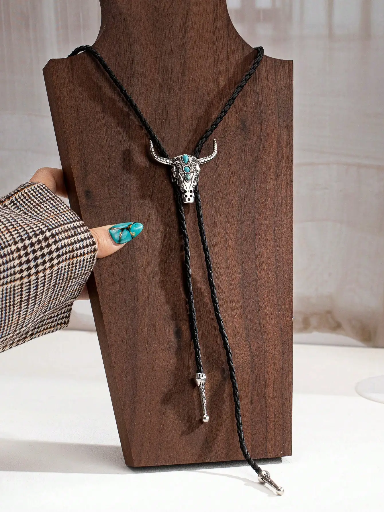 

Western Cow Skull Bolo Tie Necklace with Turquoise Accents for Women, Black Braided Cord