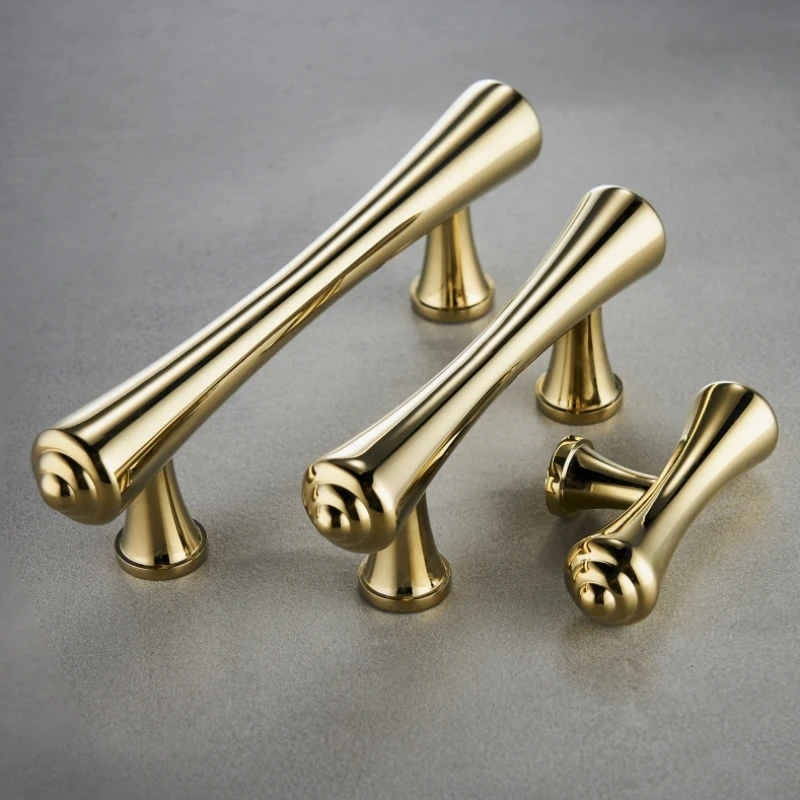 

Brass, shiny gold, round and modern minimalist furniture, cabinet doors, drawer handles, light luxury