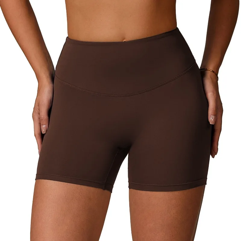 Pantaloncini da yoga transfrontalieri a vita alta e sollevamento dei fianchi indossati su pantaloncini sportivi attillati, dimagranti e da corsa per un look femminile