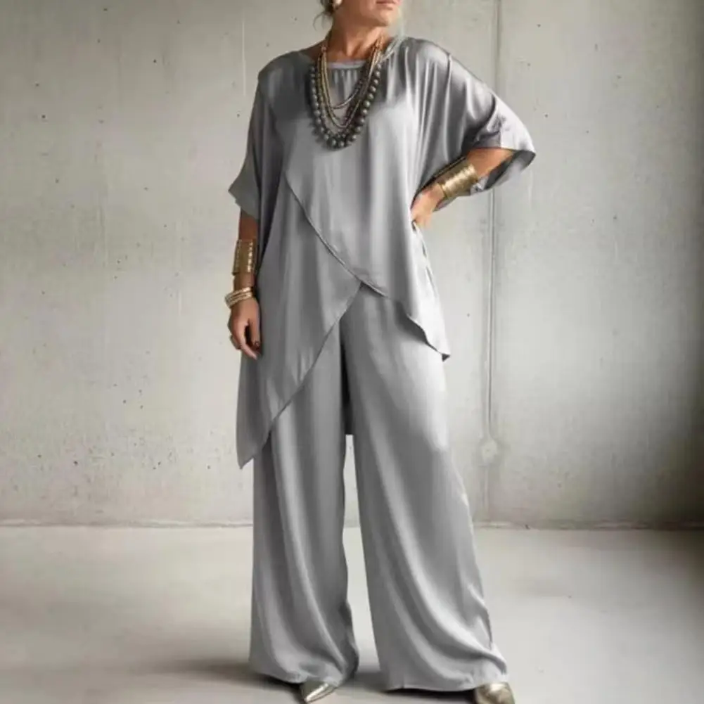 

Women's 2 Piece Satin Outfits Half Sleeve Asymmetrical Hem Top Wide Leg Pants Sets Summer Loose Lounge Sets Casual Women Outfit