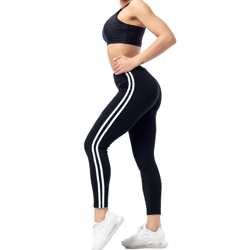 2025 nuevo modelo, pantalones casuales de tiras blancas laterales de moda para mujer, pantalones finos y finos de nueve puntos, pantalones de chándal elásticos para mujer