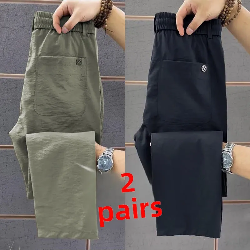 กางเกงขายาวผ้าไหมน้ำแข็งใหม่สำหรับฤดูร้อน เอวยางยืด ทรงตรง ระบายอากาศได้ดี สวมใส่สบายๆ ลำลอง เหมาะสำหรับวัยรุ่น ผลิตในจีน