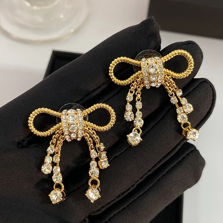 

Trend Designer Crystal Bow Gold Luxury Earrings Women Top Quality Boutique Famous Brand Fancy Jewelry