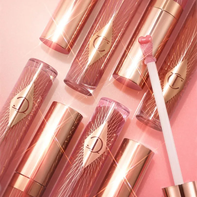 

Бальзам для губ Charlotte Tilbury Collagen Lip Bath Sugar Heart Water Light с зеркальным блеском и кисточкой в форме сердца