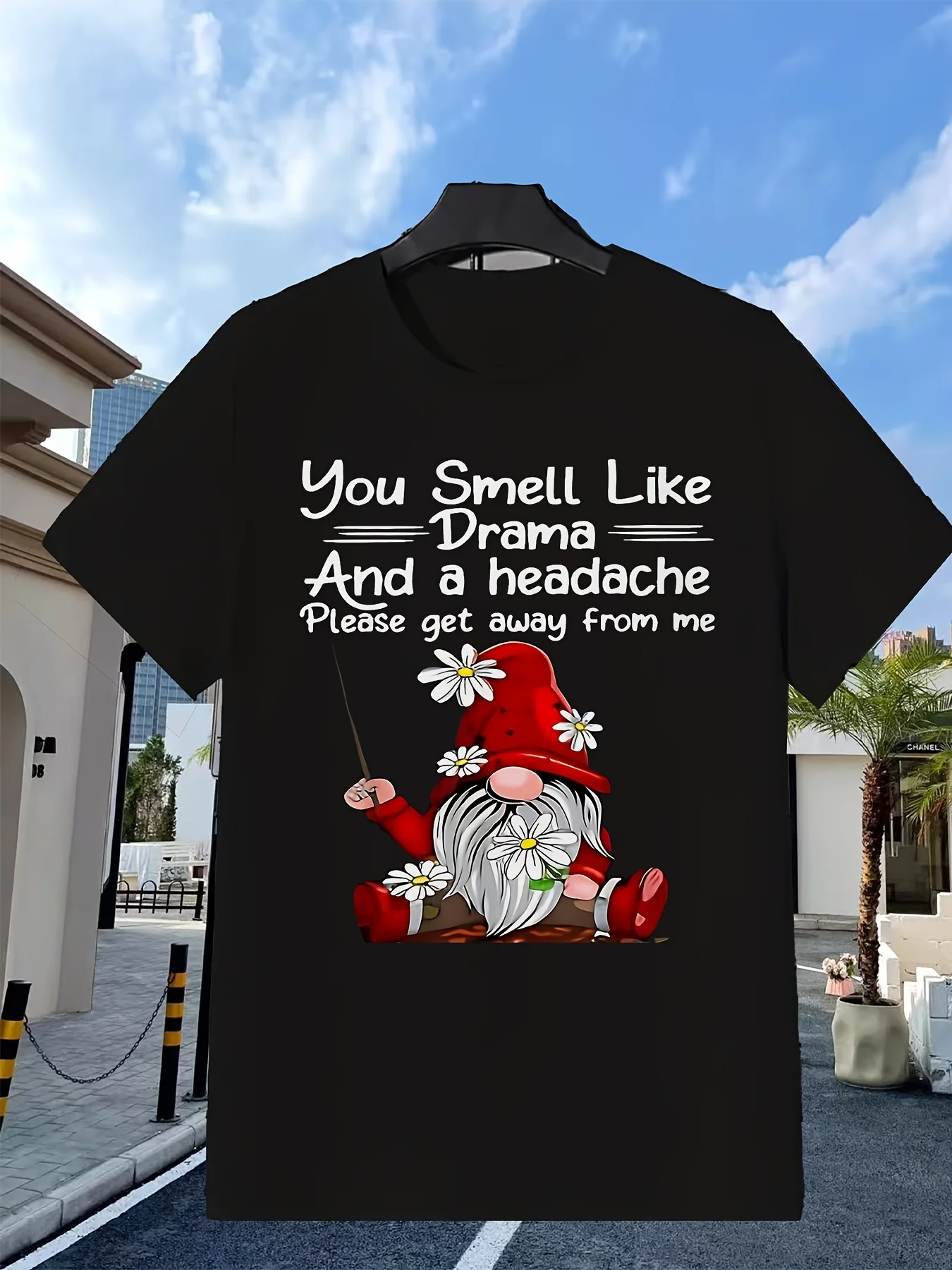 Gnome pattern T-shirt, red version. You're full of drama and give me a headache. Please stay away from me. Printed with daisy and gnome character designs. Suitable for casual wear and as a fun gift