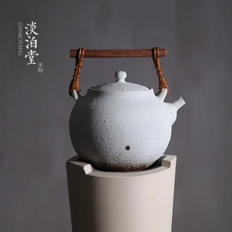 Chinese-style ceramic handmade teapot kettle with wooden handle and beam pot stoneware fire-resistant teapot tea set