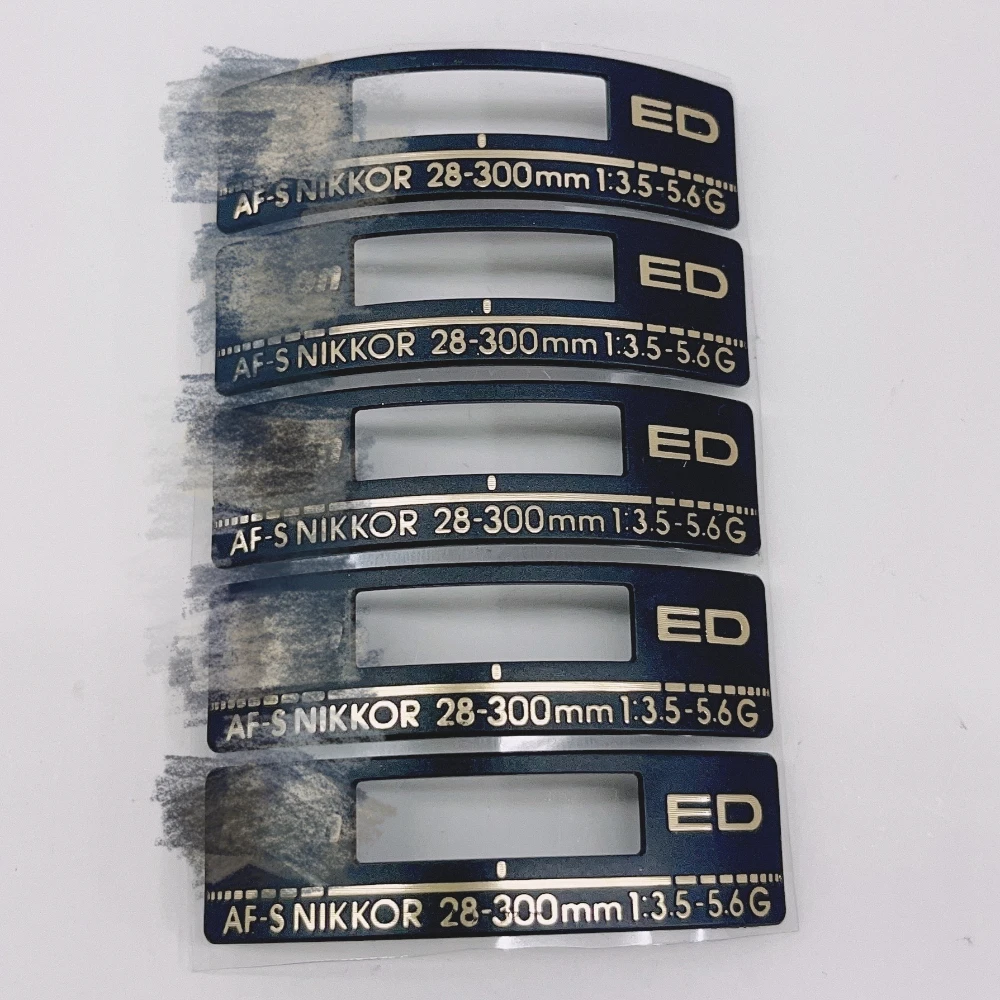 1ชิ้นใหม่สำหรับ Nikon 28-300ป้ายป้ายชื่อโลโก้ SLR อุปกรณ์เสริมกล้อง