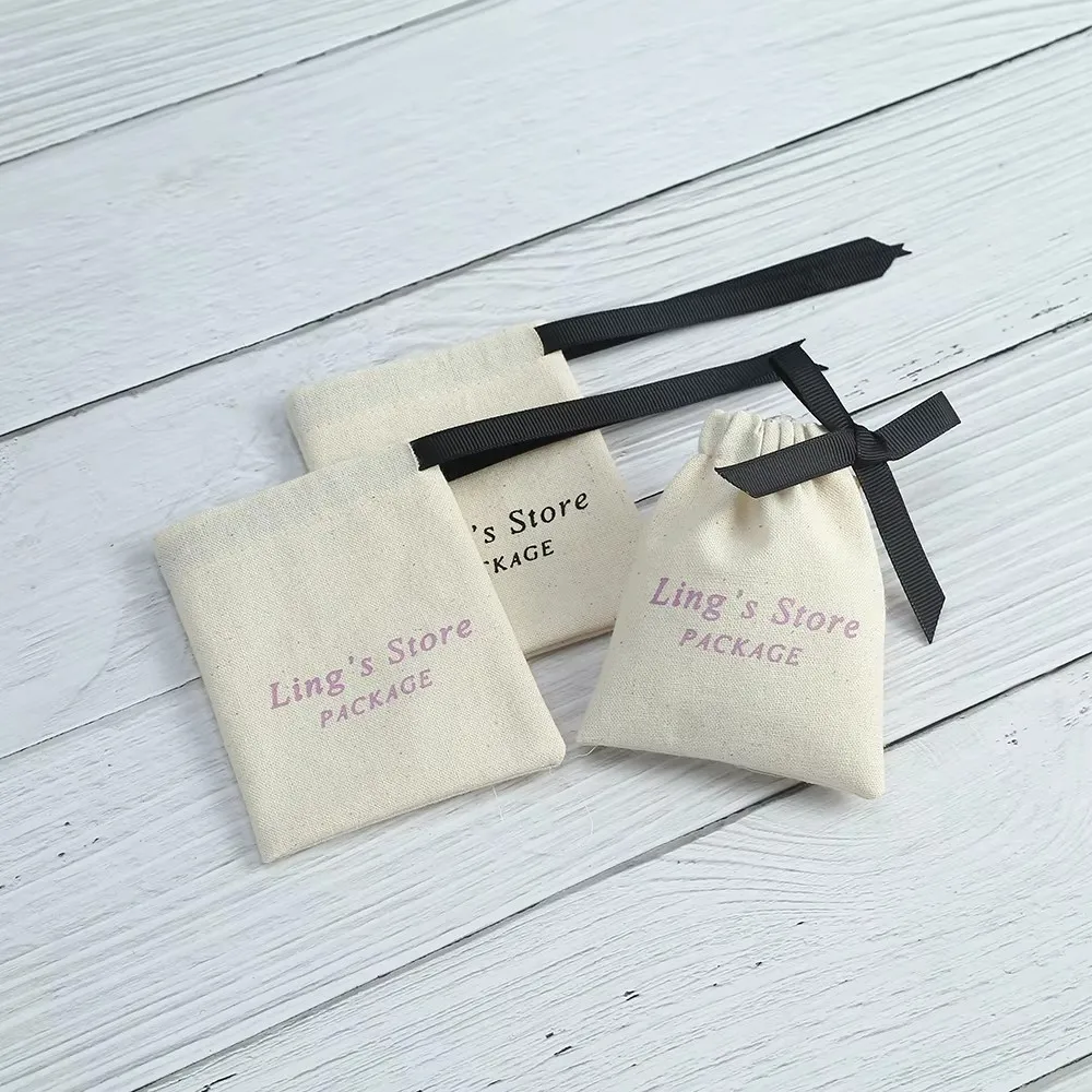 

100Pcs Personalized Logo Custom Nature Cotton Drawstring Bags Packaging Chic Wedding Favor Bag with Black Ribbon Jewelry Pouches