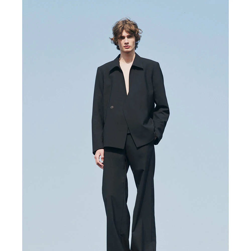 

Мужской черный свободный костюм-двойка: минималистичный однотонный повседневный пиджак и брюки с широкими штанинами – модный уличный наряд для вечеринок