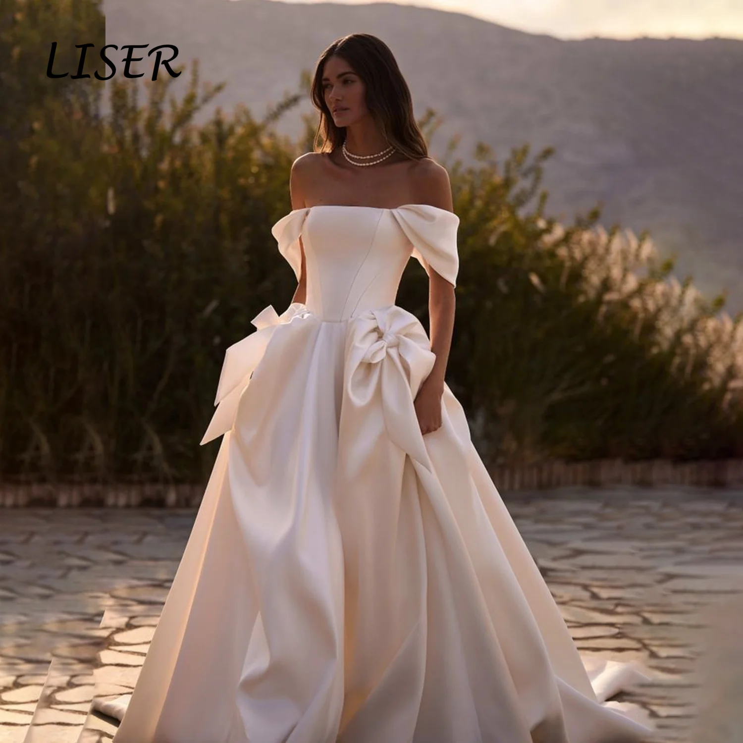 Liser Customized Ivory Off Shoulder Fold Satin Wedding Dress Big Side Bow Detail Voluminous Skirt Long Train Simple Bridal Gown