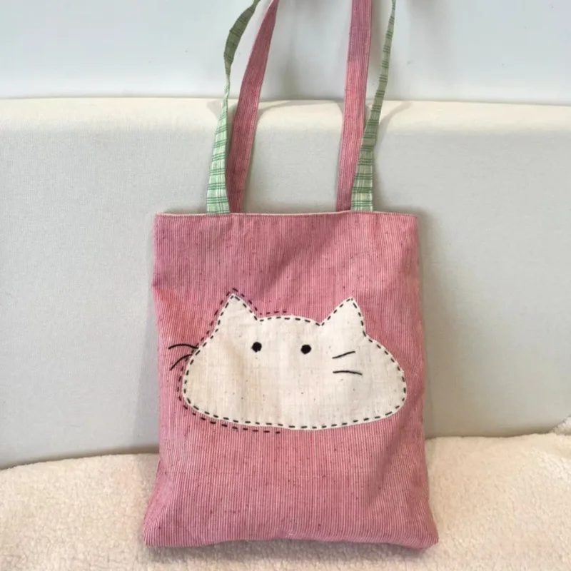 2025 New Japanese Shoulder Bag Versatile Simple Canvas Women's Bag Cute Cartoon Cat Literary Commuter Bag