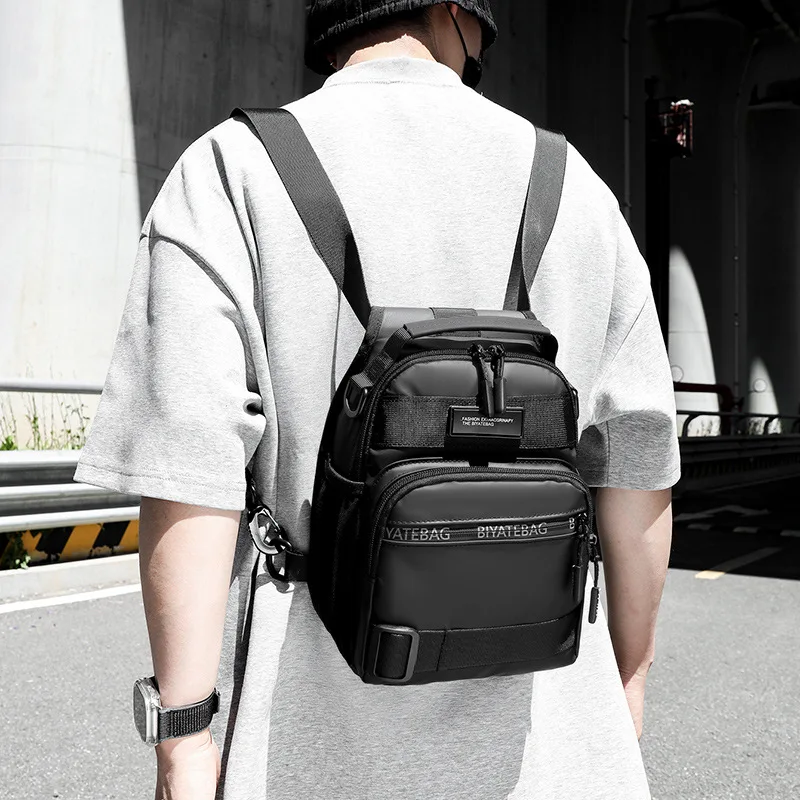 Multi-layered waterproof PU men's hand-held backpack, multi-functional chest bag, multi-purpose crossbody bag