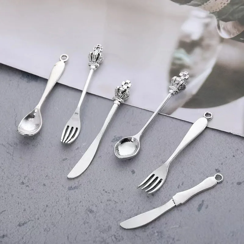 

DIY retro alloy jewelry accessory pendant, three-dimensional crown knife, simulated spoon pendant