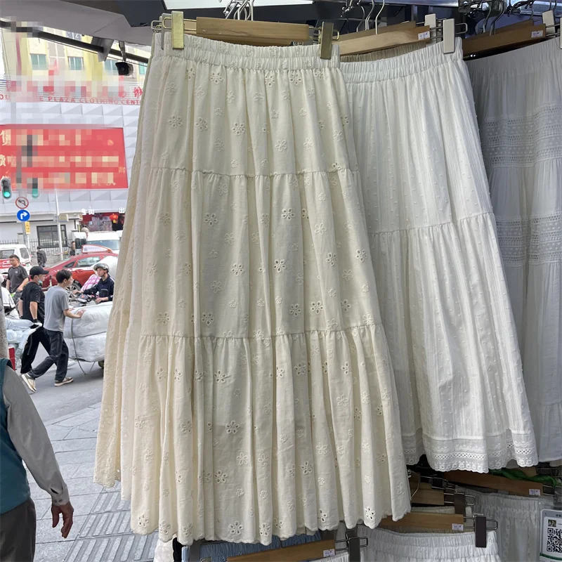 تنورة عصرية من الدانتيل على شكل حرف A مع تصميم مجوف بخصر مطاطي وربط مطوي للنساء في الصيف الساخن