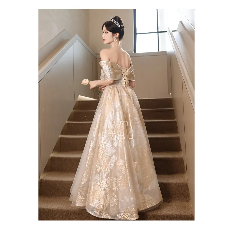 2026 New Women's Spring Festival Golden One Shoulder Evening Dress Fashionable Slimming Annual Meeting Art Exam Host Long Dress