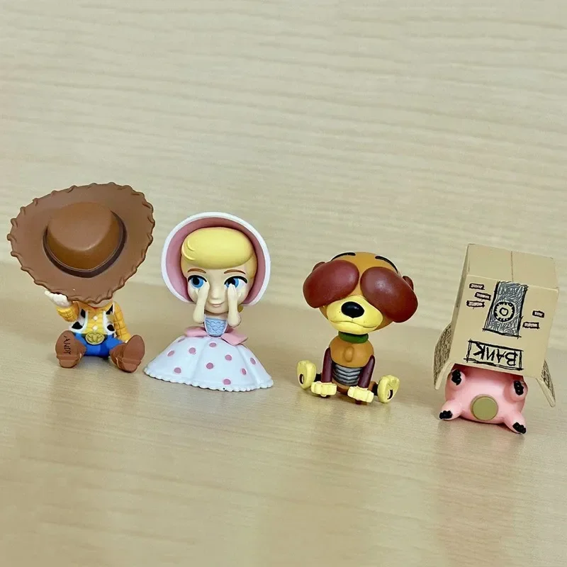 4 ชิ้น/เซ็ตอะนิเมะ Toy Story ซ่อนและค้นหาเครื่องประดับ Woody Slinky สุนัข Bo Peep Action Figure เดสก์ท็อปชุดตกแต่งของขวัญ