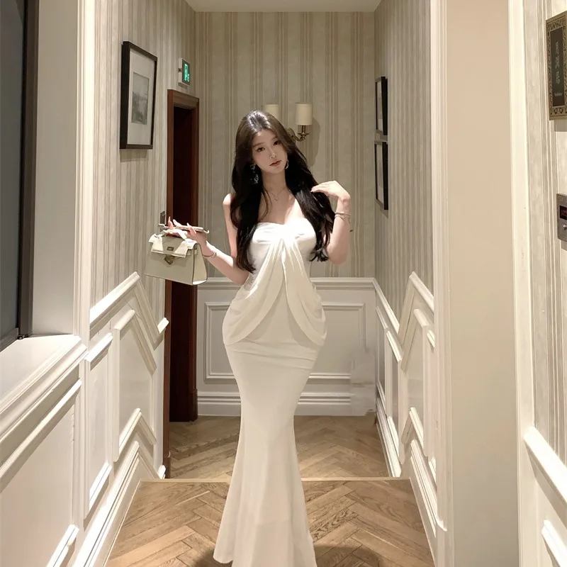 ชุดเดรสยาวสีขาว สายเดี่ยว ทรงหางปลา ดีไซน์เกาหลี เอวสูง แฟชั่นผู้หญิง รุ่นใหม่ล่าสุด ฤดูใบไม้ผลิ ฤดูใบไม้ร่วง