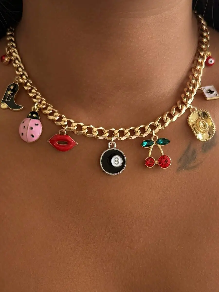 

Chunky Gold-Tone Chain Necklace With Western Boot, Cowboy Hat, Red Lips, Cherries, 8-Ball, Ladybug, And Evil Eye Charms For